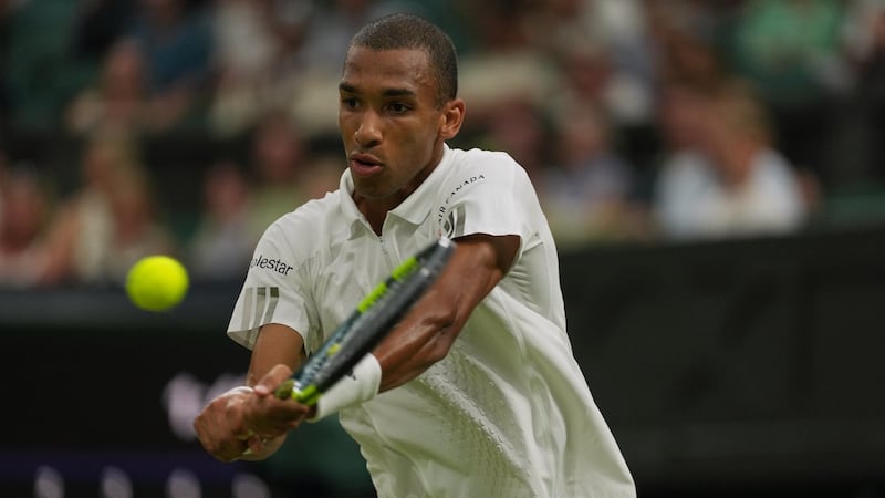 Auger-Aliassime eases into Wimbledon fourth round with win over Zheng
