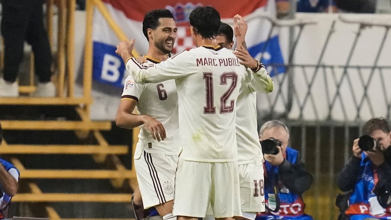 Merino comes up clutch again for Spain as Kane marks record-setting match with two goals for England