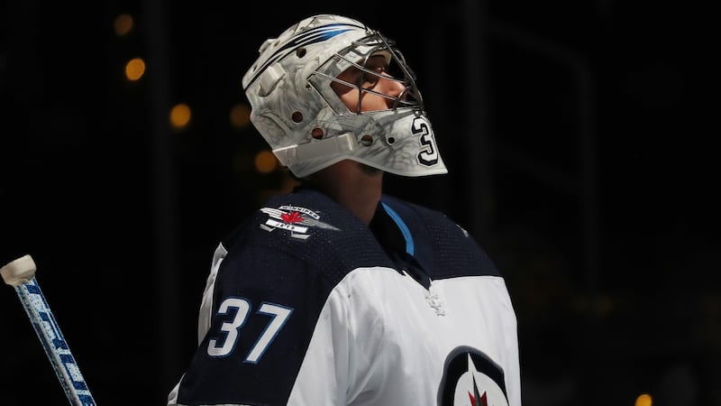 Hellebuyck’s illustrious Jets career comes to sour end following trade to Devils
