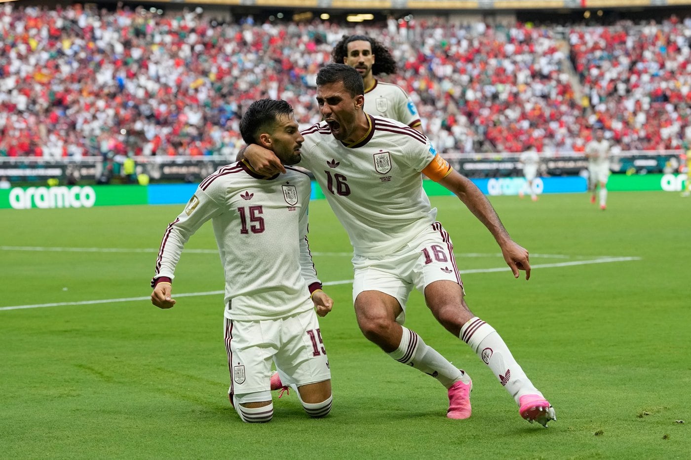 Spain wins Group H, beating Uruguay as Muslera’s error sends two-time champ