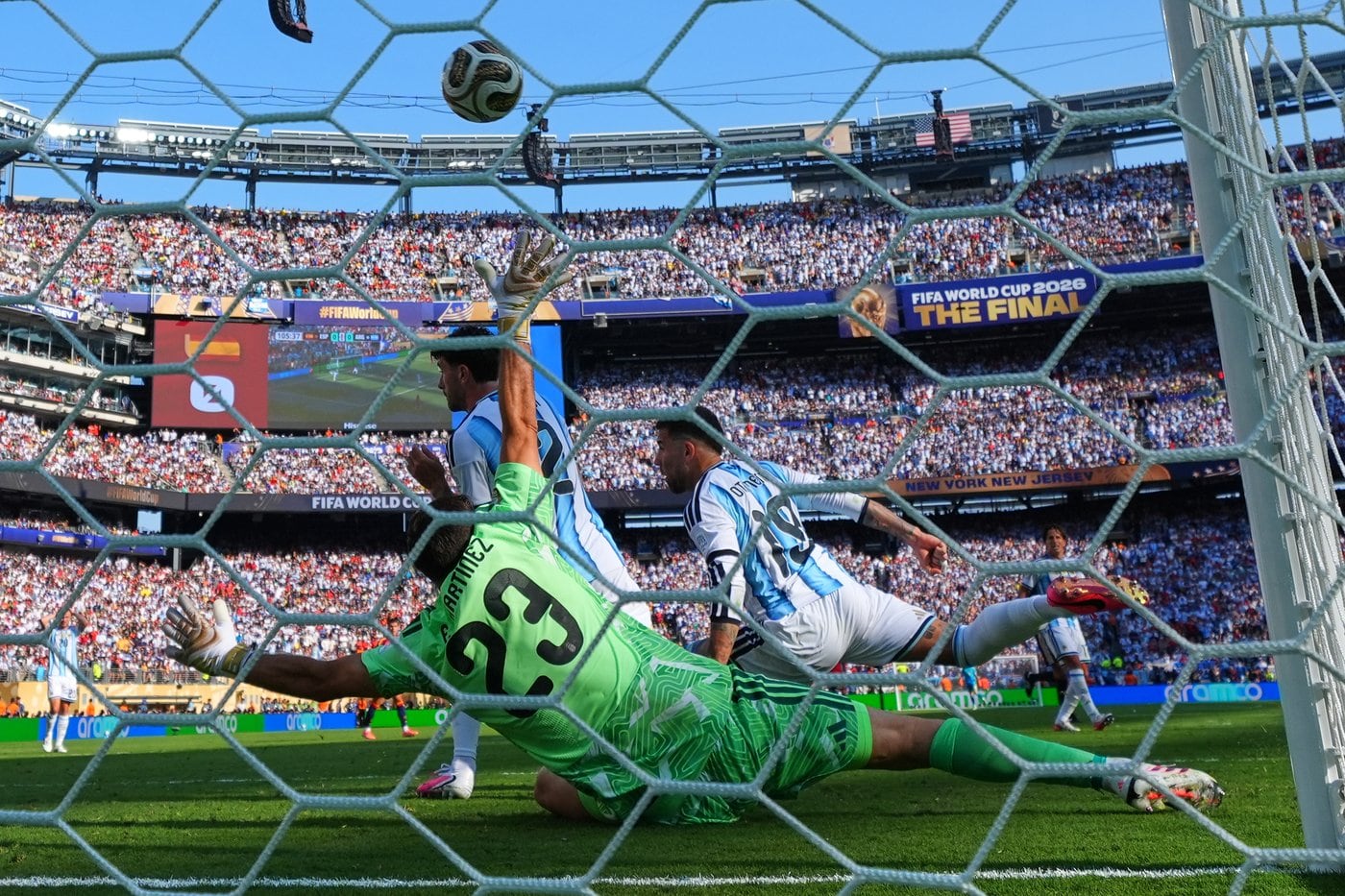 Argentina's Martinez plays cool in net, even as teammates turn reckless in