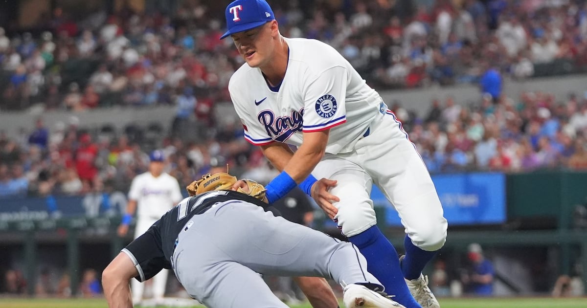 Photo: tsn.ca Texas Rangers third baseman Josh Jung, right, tags out Chicago White Sox's Sam Antonacci, left, between third and home plate