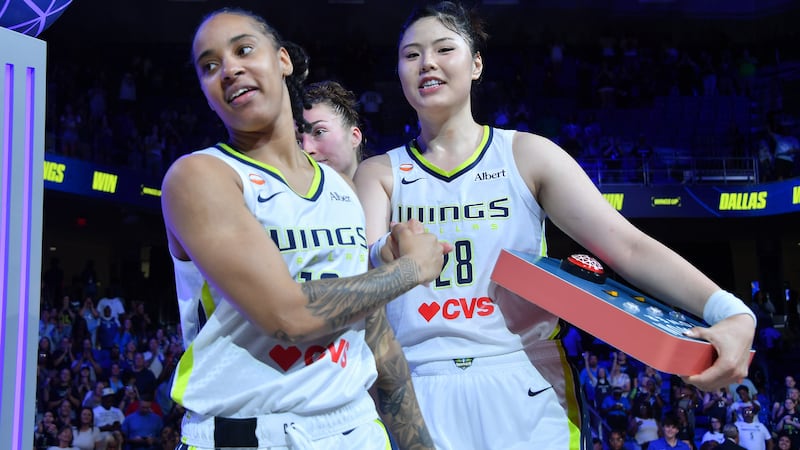 Yueru hits 2 late free throws as Wings rally past Sky