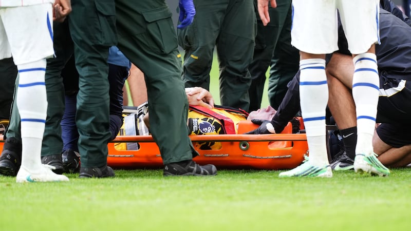 Martinez carried off on stretcher and heading to the hospital after collision in Premier League game