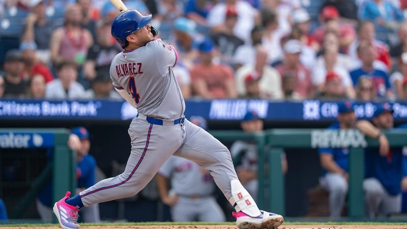 Alvarez homers twice as Mets beat Phillies under smoky sky