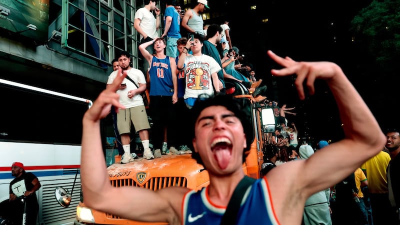 Mayhem mars euphoria as New York City celebrates the Knicks' first championship in 53 years