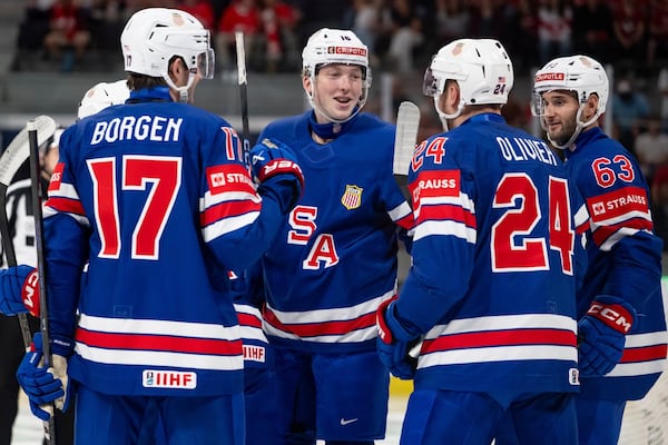 USA downs Austria to set up QF vs. Canada at Men’s Worlds; Sweden advances
