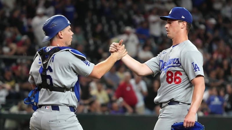 Dodgers place 3-time All-Star C Smith on injured list with neck inflammation