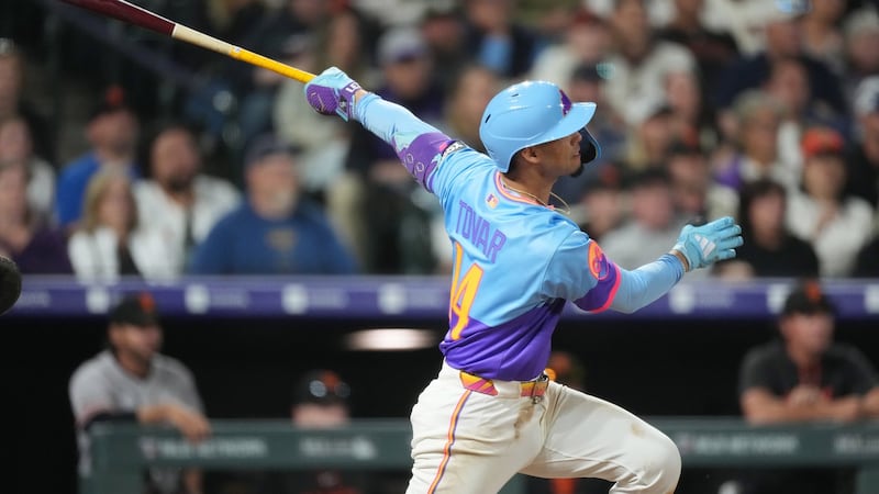 Tovar, Goodman homer in five-run 9th as Rockies beat Giants