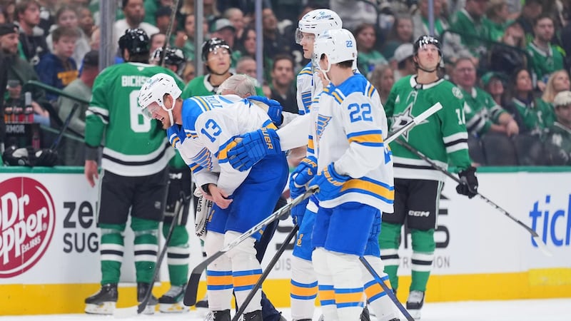 Blues forward Toropchenko leaves season opener with apparent shoulder injury