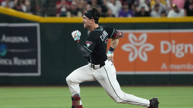 Carroll has two run-scoring triples to help Diamondbacks blow out hapless Rockies