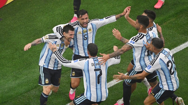 Messi sets World Cup scoring record as defending champ Argentina advances to knockout stage