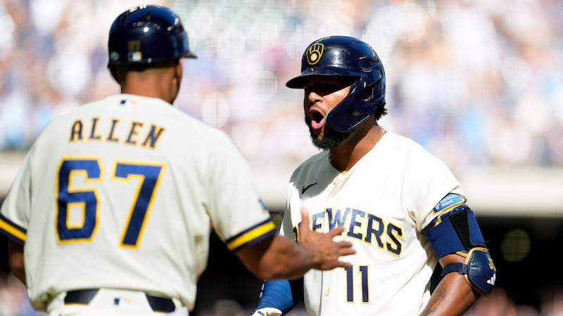 Brewers rally in 8th and hold off comeback attempt in win over Cubs