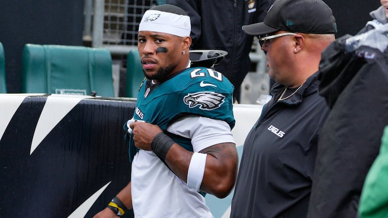 Eagles running back Barkley leaves game against Rams with apparent hamstring injury