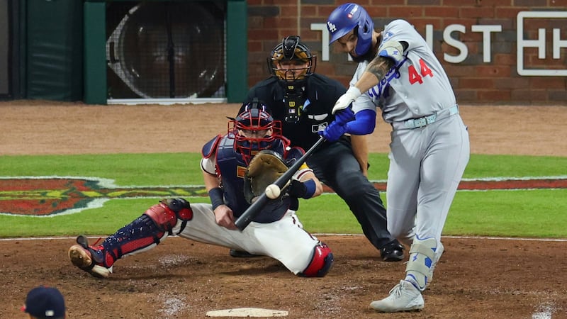 Pages delivers go-ahead single as Dodgers beat Braves to reach third straight NLCS