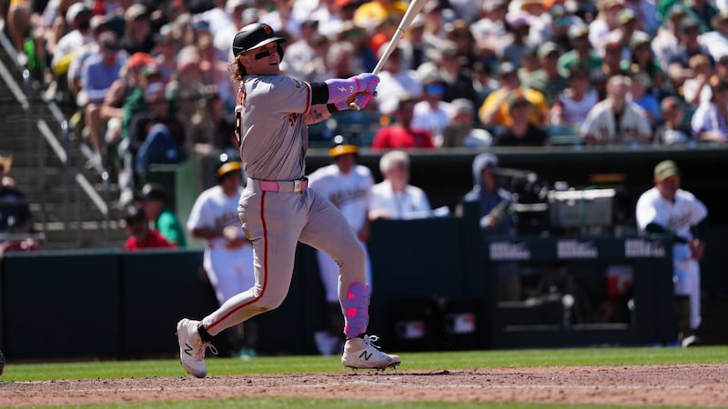Bader’s wind-aided grand slam helps Giants breeze to victory over Athletics