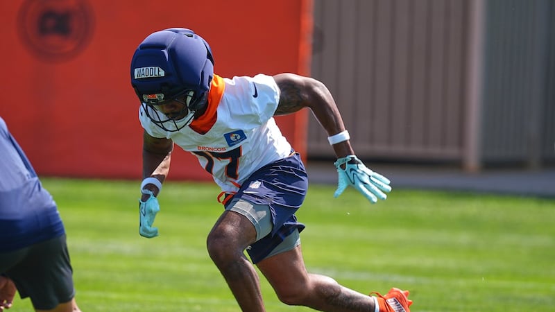 Quiet moments at Broncos camp after Waddle pulls up, Nix gets knocked down. Both are OK