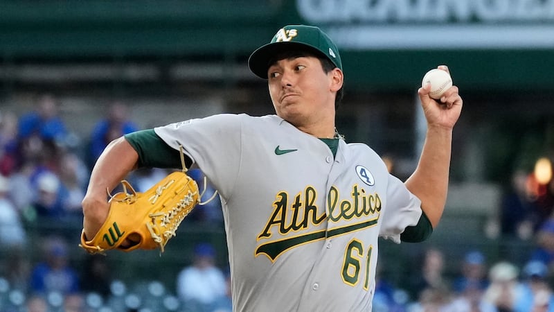 Jump gets first career win as Athletics beat Cubs