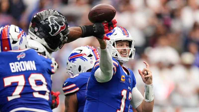 Allen connects with Palmer for late TD as Bills beat Texans in wild opener