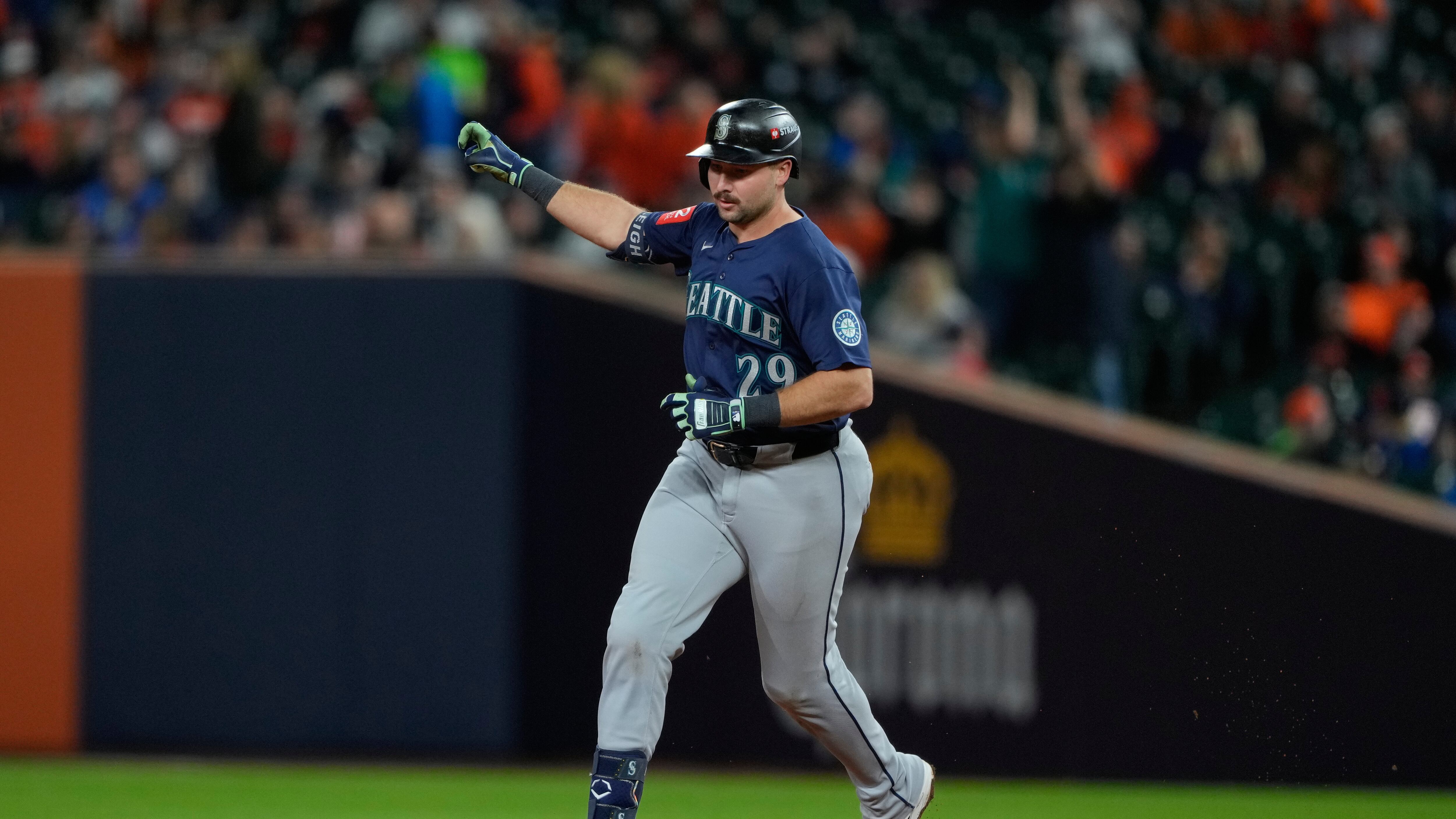 Cal Raleigh With Fans Mariners' Cal Raleigh sends first postseason homer to fan in 'Dump Here ...