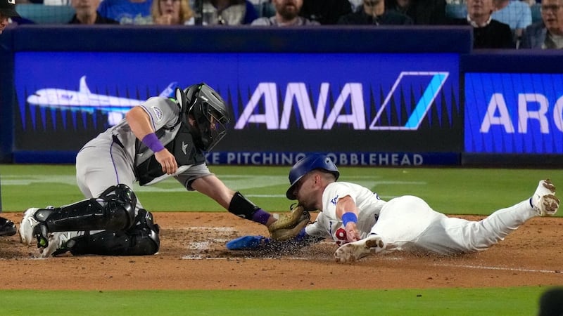 Rockies rally past Dodgers after two errors in the eighth