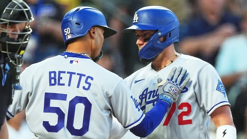 Betts homers, has RBI single in 10th as Dodgers beat Rockies