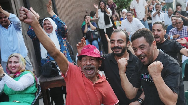 A Cairo coffee house erupts, then goes silent as Egypt’s World Cup run meets Argentina