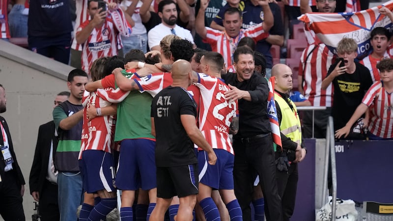 David steers Atlético Madrid past 10-man Real Madrid