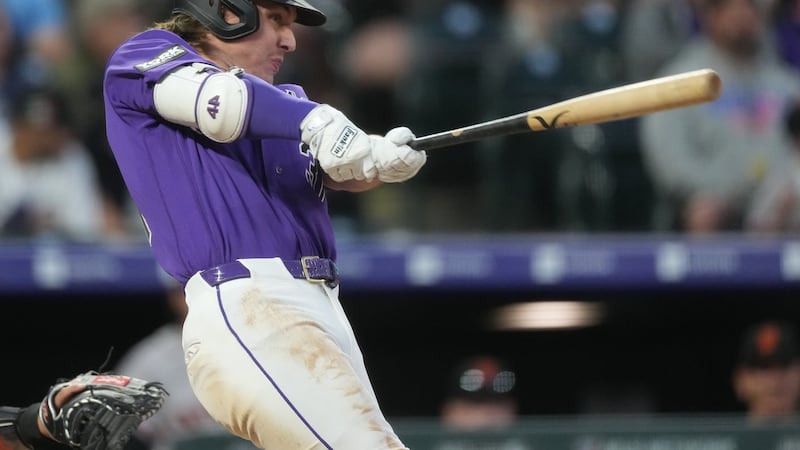 McCarthy hits two-run homer as Rockies beat Giants