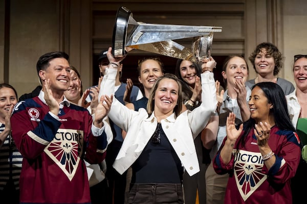 Victoire visit city hall to sign golden book after Walter Cup victory