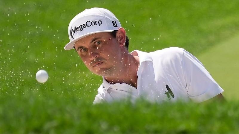 Poston handles wind at Memorial for low round of tournament and lead
