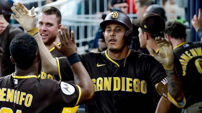 Machado homers twice, Tatis hits longest homer of season to lead Padres to win over Braves