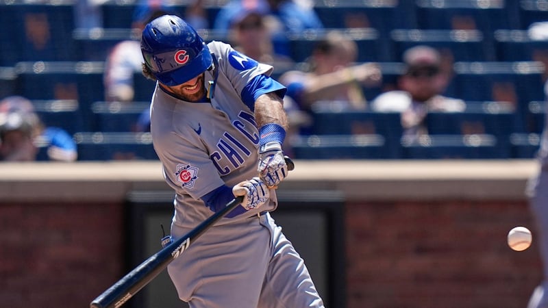 Swanson has two homers, seven RBI as Cubs pound Mets in DH opener