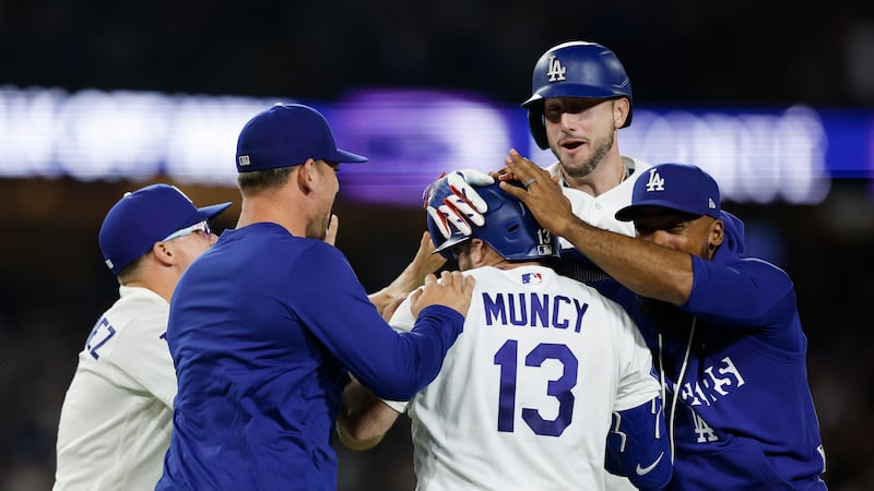 Muncy’s 10th-inning single lifts Dodgers to walk-off win over Royals