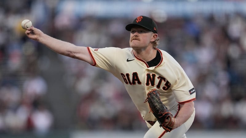 Whitcomb chops a single in 11th for first career walk-off as Giants beat Cardinals