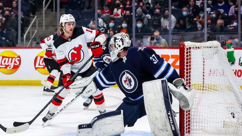Jets trade Hellebuyck to Devils for package headlined by Mercer, prospect Command as saga comes to an end