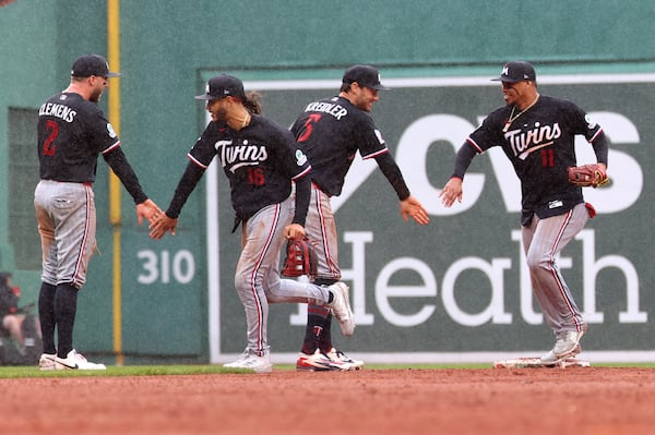 Twins complete three-game sweep over Red Sox with win at soggy Fenway Park