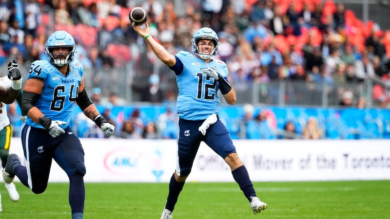 Kelly throws two TD passes as Argonauts clinch playoff berth with win over Elks