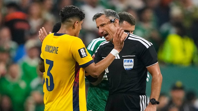 Why are World Cup refs giving red cards to players covering their mouths when confronting opponents?