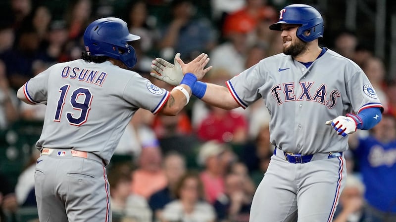 Burger blasts a homer, drives in 4 as Eovaldi powers Rangers past Astros