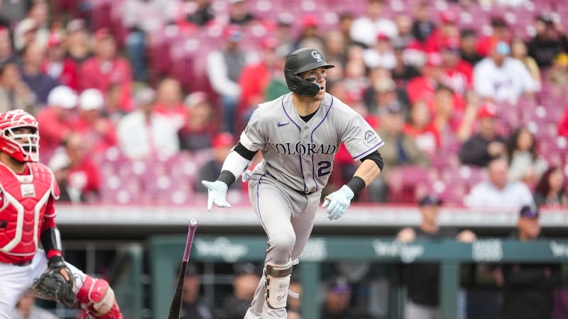 Goodman hits two homers as Rockies hammer Reds