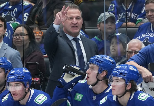Canucks fire Foote after one season behind bench; three assistants also let go
