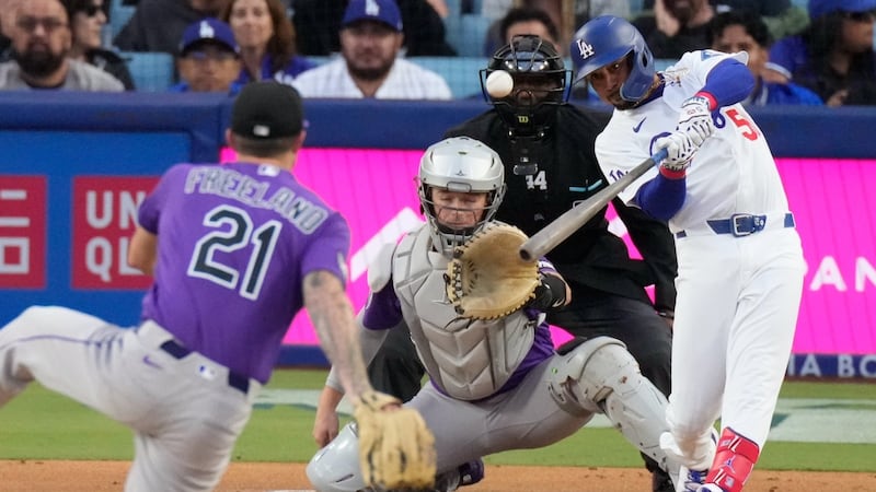 Betts blasts 2 homers and drives in 5 as Dodgers crush Rockies