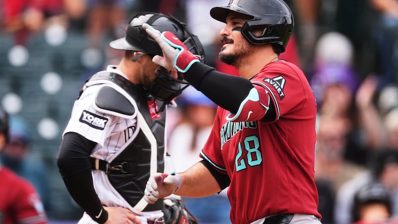 Diamondbacks maintain slim playoff hopes with win over Rockies