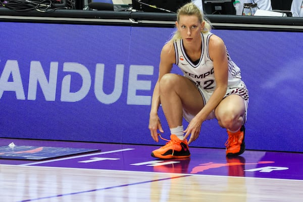 Tempo signs Pouye, waives Held