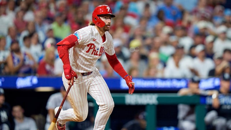 Stott homers, drives in five as Phillies rout Yankees to avoid series sweep