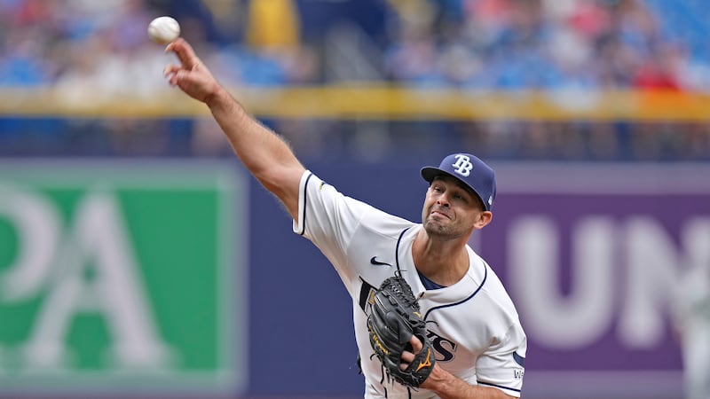 Martinez dominates former team, leads Rays to win over Reds