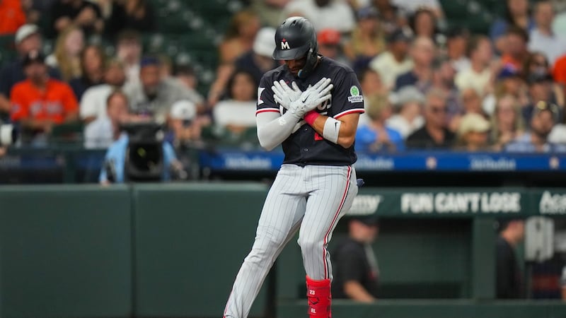 Twins hit three homers to back Matthews, then hold off Astros rally in ninth for victory