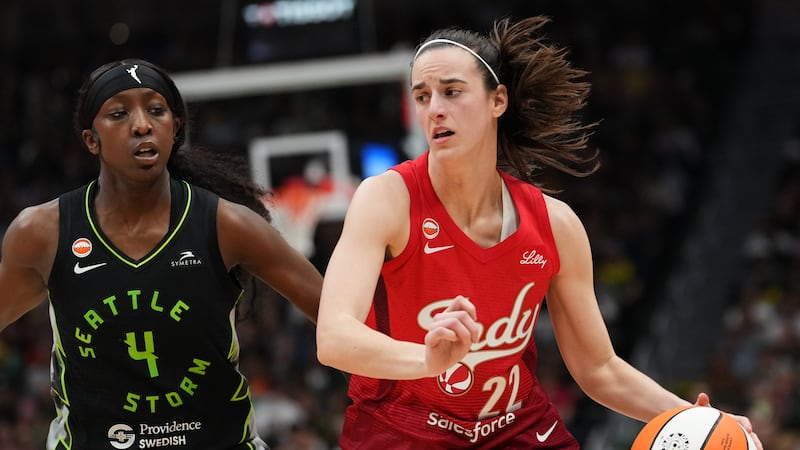 Clark has triple-double in the Fever’s victory over the Fire