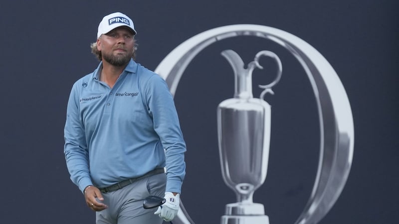 Cigarette smoker Brown lights up Open Championship with another strong first round